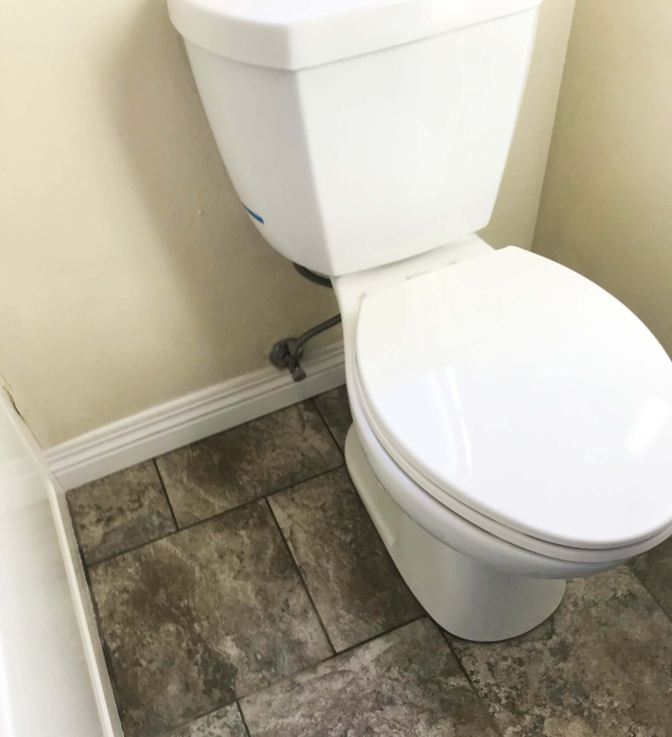 white toilet in bathroom
